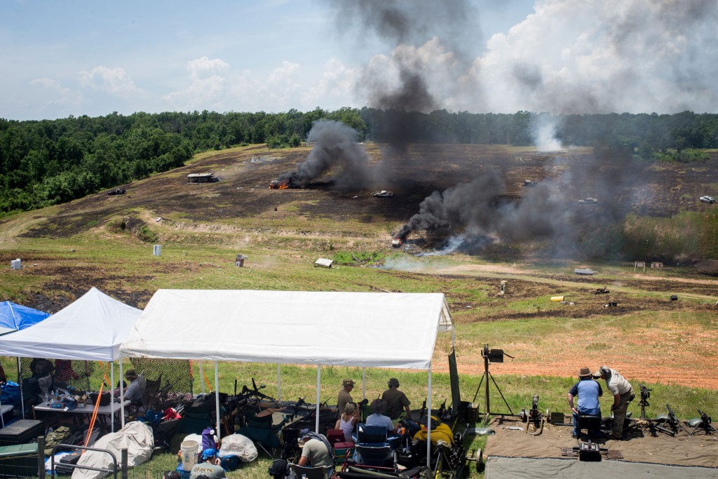 Gun shots and explosions fill the firing range at the Oklahoma Full Auto Shoot and Trade Show in Wyandotte, Ok. on June 21.  Jim Tuttle 